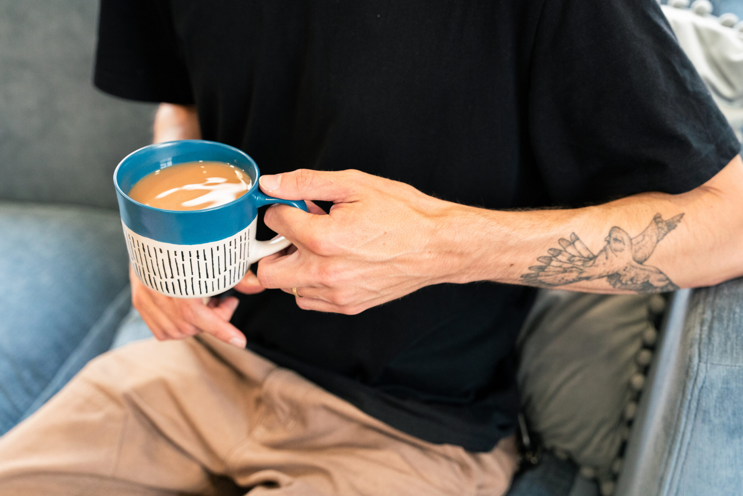 Man holding a cup of tea