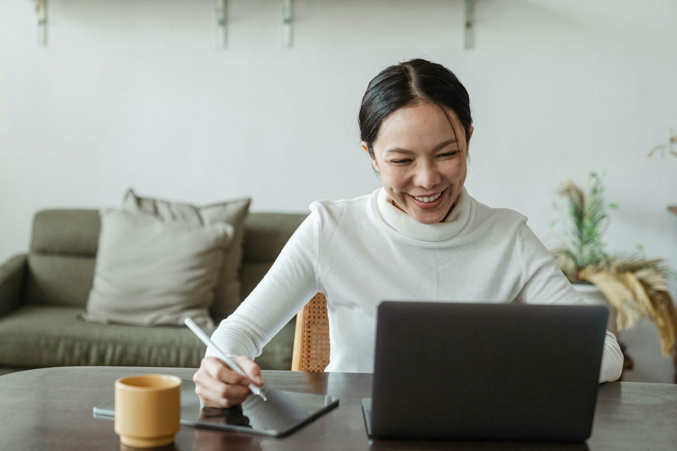 Woman making video call on laptop